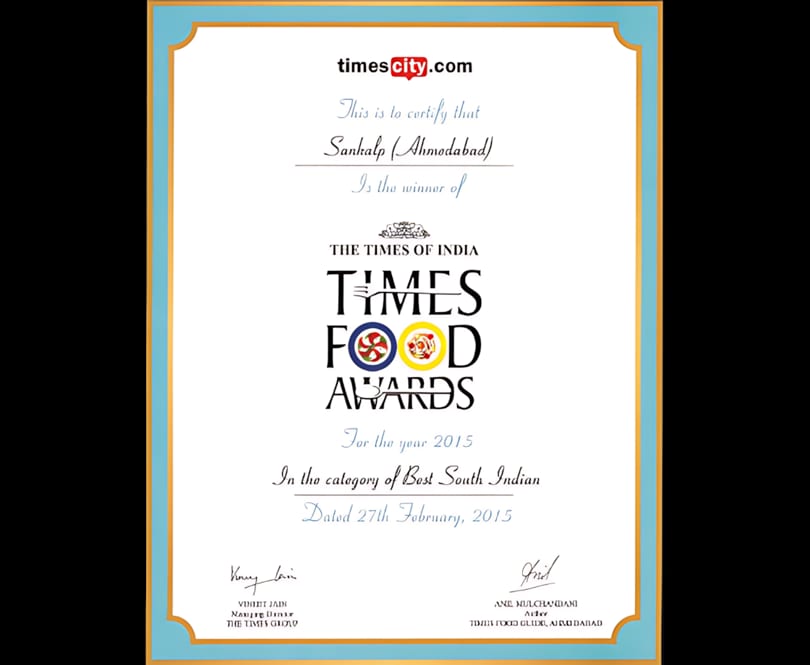 A certificate from Times Food Awards 2015, recognizing Sankalp (Ahmedabad) for Best South Indian cuisine.