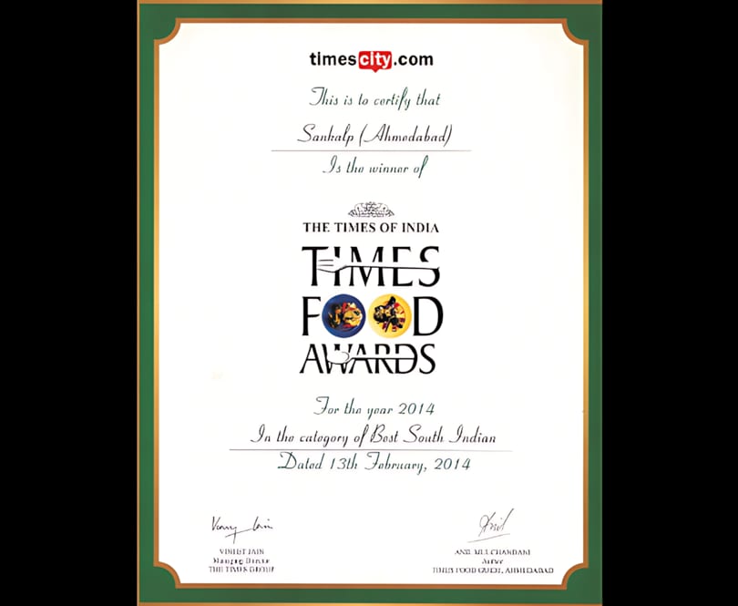 A Times Food Awards certificate from 2014, recognizing Sankalp (Ahmedabad) for Best South Indian cuisine.